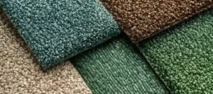 Colorful textured carpet samples displayed in natural light