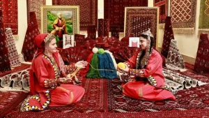 Traditional Turkmen carpet weaving in Golestan province, showcasing vibrant patterns and skilled craftsmanship