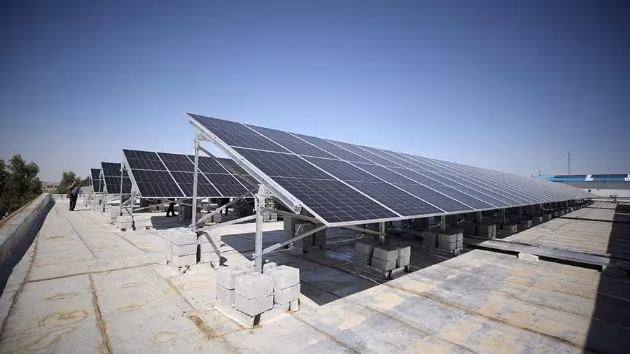 Solomon Carpet factory rooftop with installed solar panels generating renewable energy in Isfahan, Iran