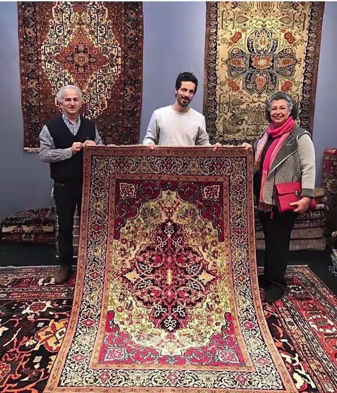 Aydah Merza with handpicked luxury handmade carpets from Iran and around the world