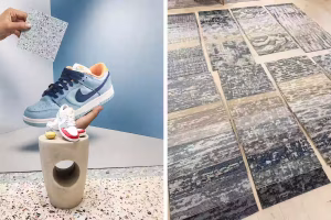 Contemporary design showcase featuring terrazzo-inspired materials, sneakers, and modern carpet surface samples displayed in a bright minimalist exhibition setting.